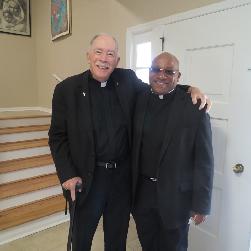 Pictured are (from left) Deacon Bob and Father Marcel. (Georgianna Penn, correspondent)