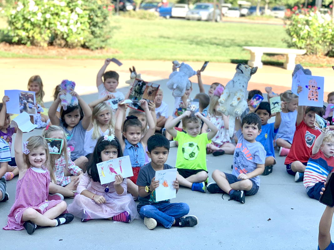 HUNTERSVILLE — Father Alfonso Gámez blessed stuffed animals and pictures of the children’s pets on the Feast Day of St. Francis of Assisi at St. Mark Church preschool. (Photos by Mary Stapleton.)