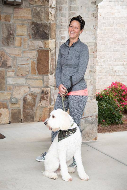 GREENSBORO — Erin Hudak with her Goldendoodle “Loki” who was blessed at St. Pius X Oct. 5. (Photos by MaryAnn Luedtke)