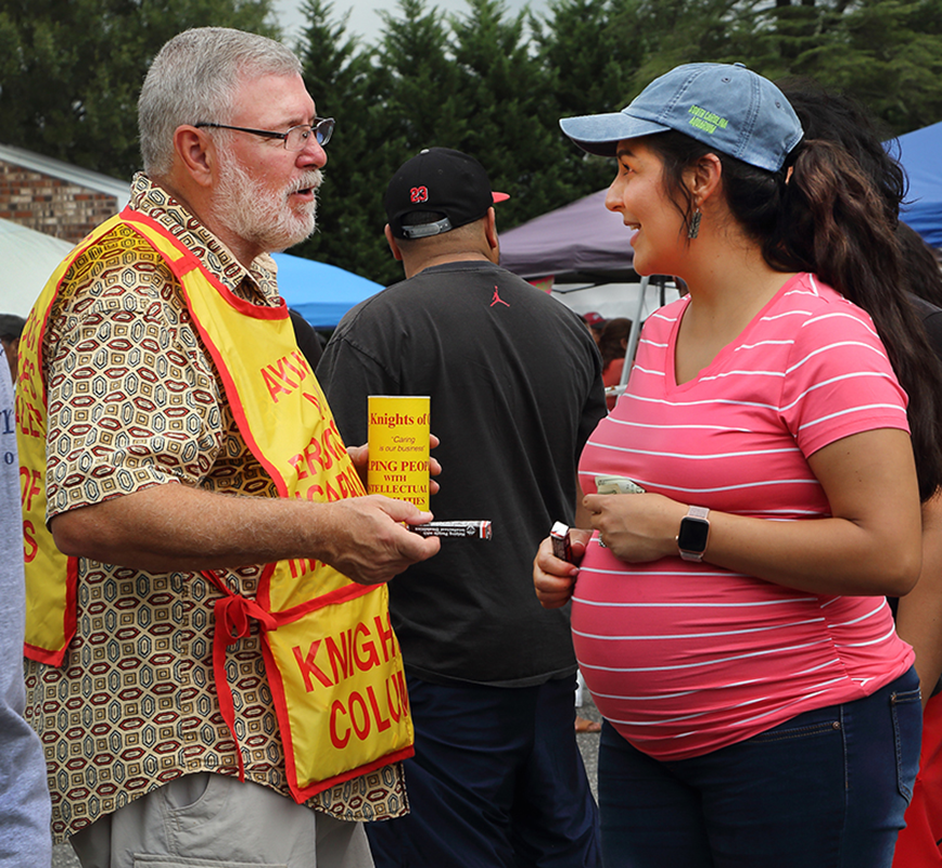 Members of the Knights of Columbus council attended the festival, passing out Tootsie Rolls, and collecting donations to support the L.A.M.B. Foundation of North Carolina, a charity dedicated solely to assisting people with intellectual disabilities.