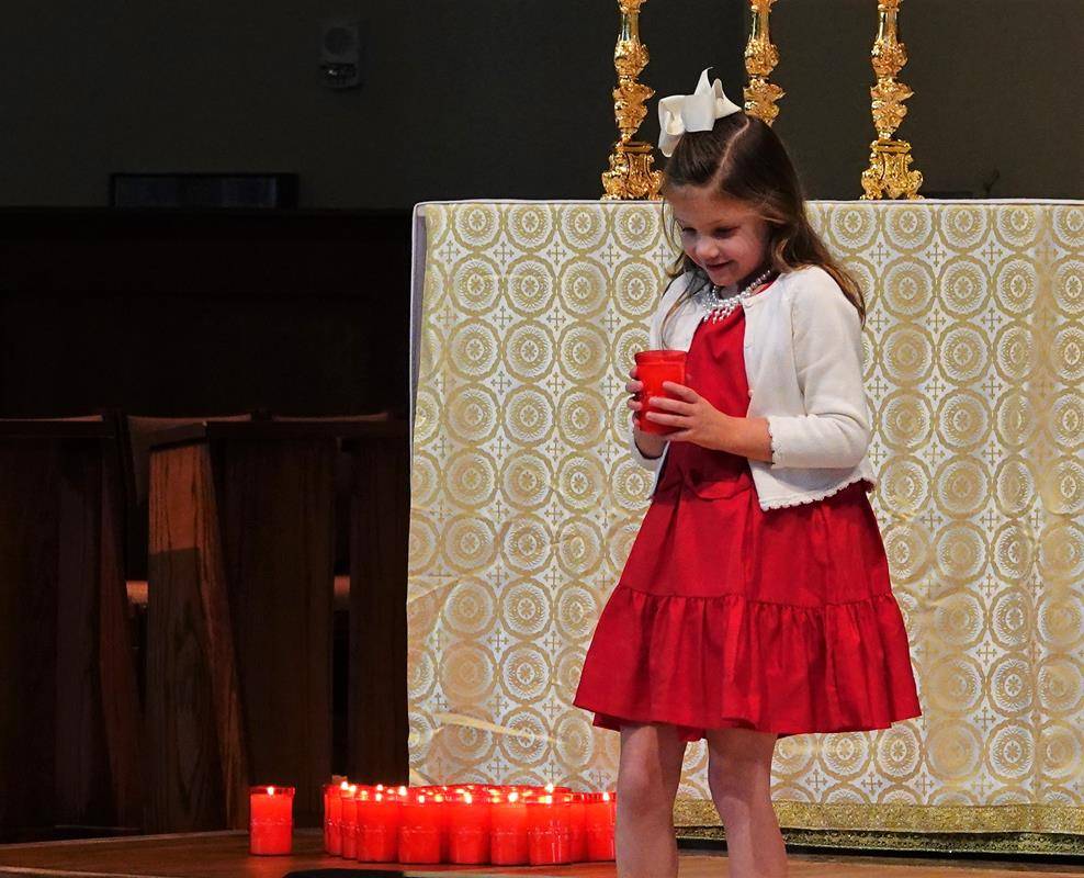 A Mass of Remembrance at St. Mark Church in Huntersville. (Photos provided by Amy Burger)