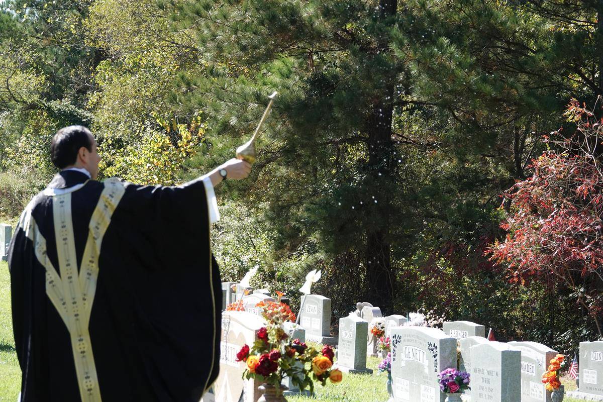 About 100 people attended the All Souls’ Day Cemetery Mass at Northlake Memorial Garden Cemetery. In his homily, Fr. Alfonso Gámez reminded us of the power of our prayers to those who have passed (Photos provided by Amy Burger)