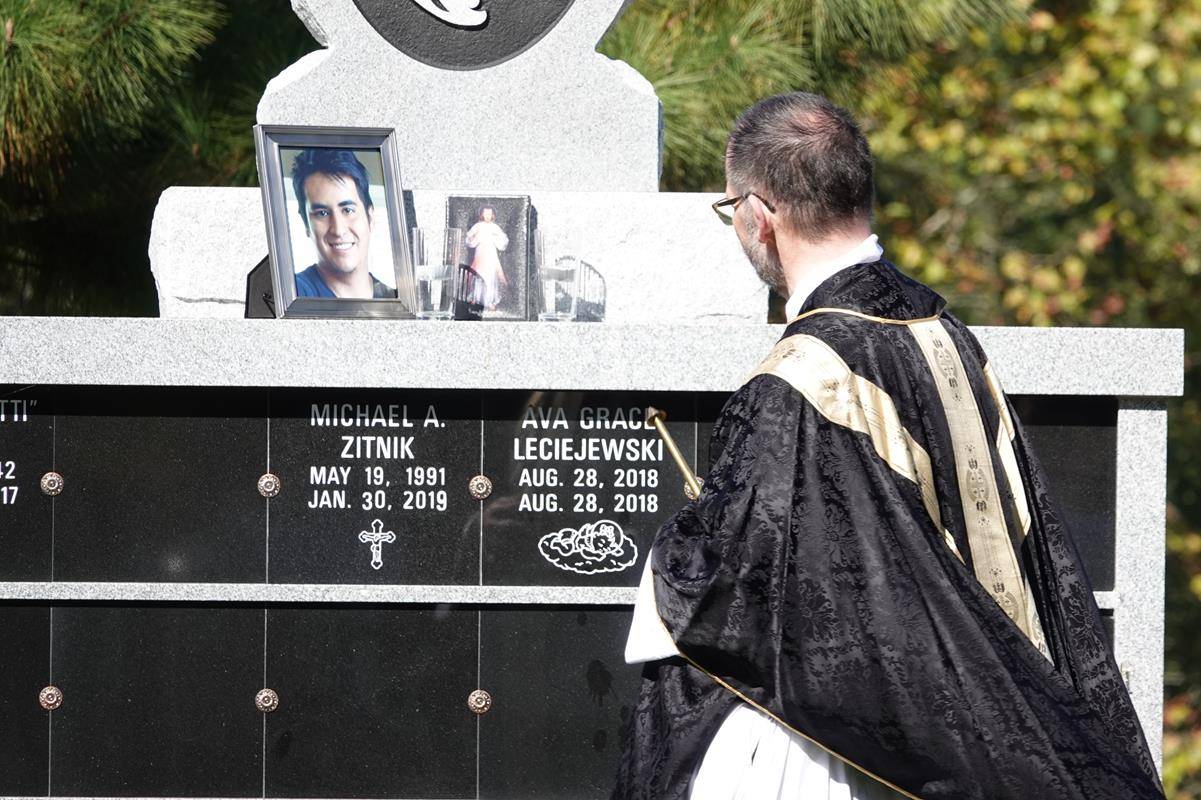 About 100 people attended the All Souls’ Day Cemetery Mass at Northlake Memorial Garden Cemetery. In his homily, Fr. Alfonso Gámez reminded us of the power of our prayers to those who have passed (Photos provided by Amy Burger)