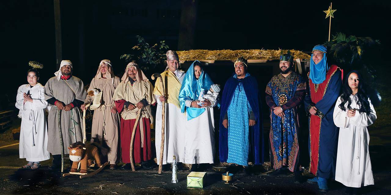 MARION — After the Christmas vigil Mass was celebrated at Our Lady of the Angels Mission Dec. 24, members of the parish’s Hispanic community presented a Live Nativity performance in front of the church. (Giuliana Polinari Riley | Catholic News Herald)