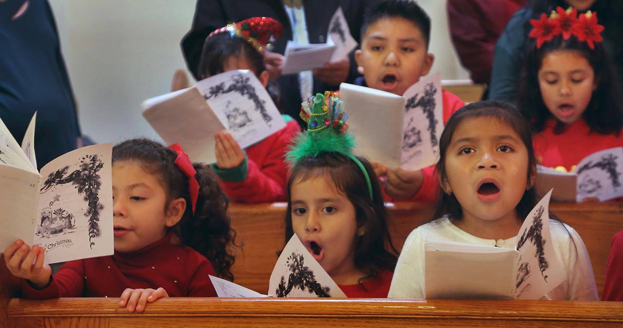 FOREST CITY — Children of the Hispanic community at Immaculate Conception Church performed the traditional play Pastorela Dec. 21. The presentation was followed by a program of Christmas songs and carols. (Giuliana Polinari Riley | Catholic News Herald)