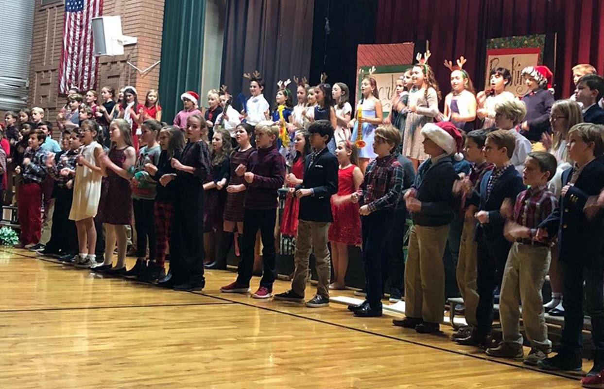 CHARLOTTE — A merry night of singing by St. Patrick School’s third- through fifth-grade classes meant everyone was filled with the spirit for “SANTA’S ROCKIN’ CHRISTMAS EVE!” (Photo via Facebook)