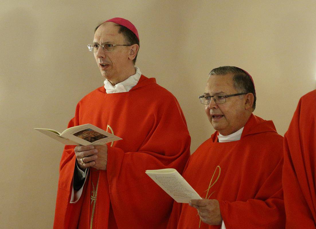 Bishop Peter J. Jugis of Charlotte, N.C., and Auxiliary Bishop Eduardo A. Nevares of Phoenix concelebrate Mass with other U.S. bishops in the crypt of St. Peter's Basilica at the Vatican Feb. 13, 2020. (CNS photo/Paul Haring) 