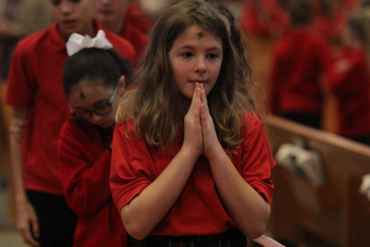 CHARLOTTE — St. Matthew School students participate in Ash Wednesday Mass at St. Matthew Church Feb. 26. (Photo by SueAnn Howell, Catholic News Herald.)