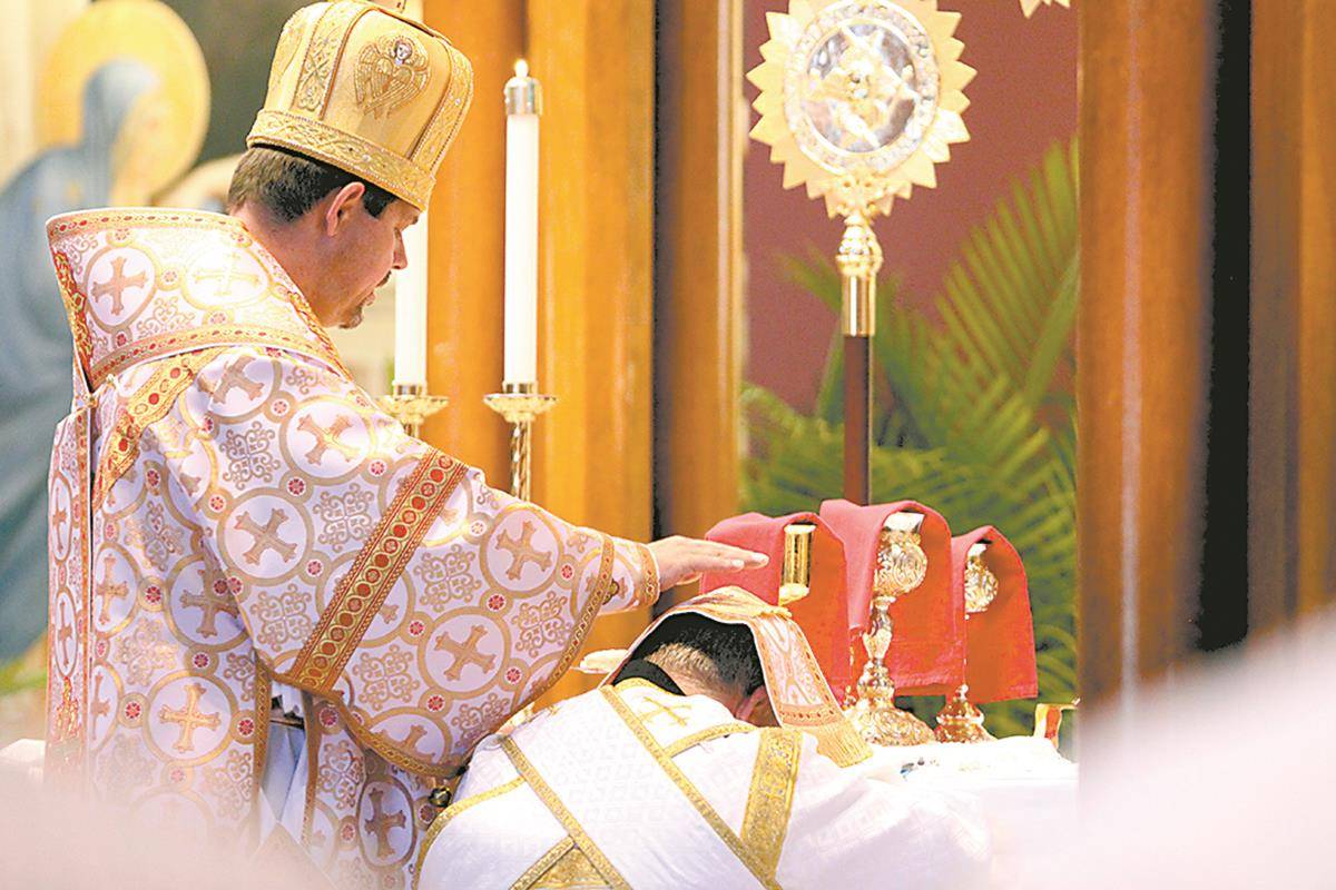 David Rinehart, kneeling before the altar, is ordained a deacon by Bishop Bohdan in 2019 during a special Divine Liturgy in Charlotte.