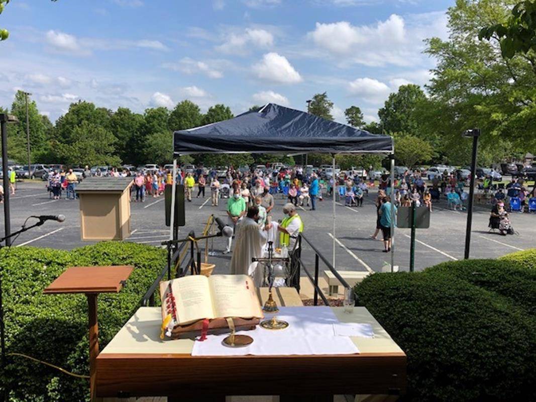 An outdoor Mass was offered by retired Father Ed Sheridan at the Catholic Conference Center in Hickory May 17. (Barbara Case Speers | Catholic News Herald)
