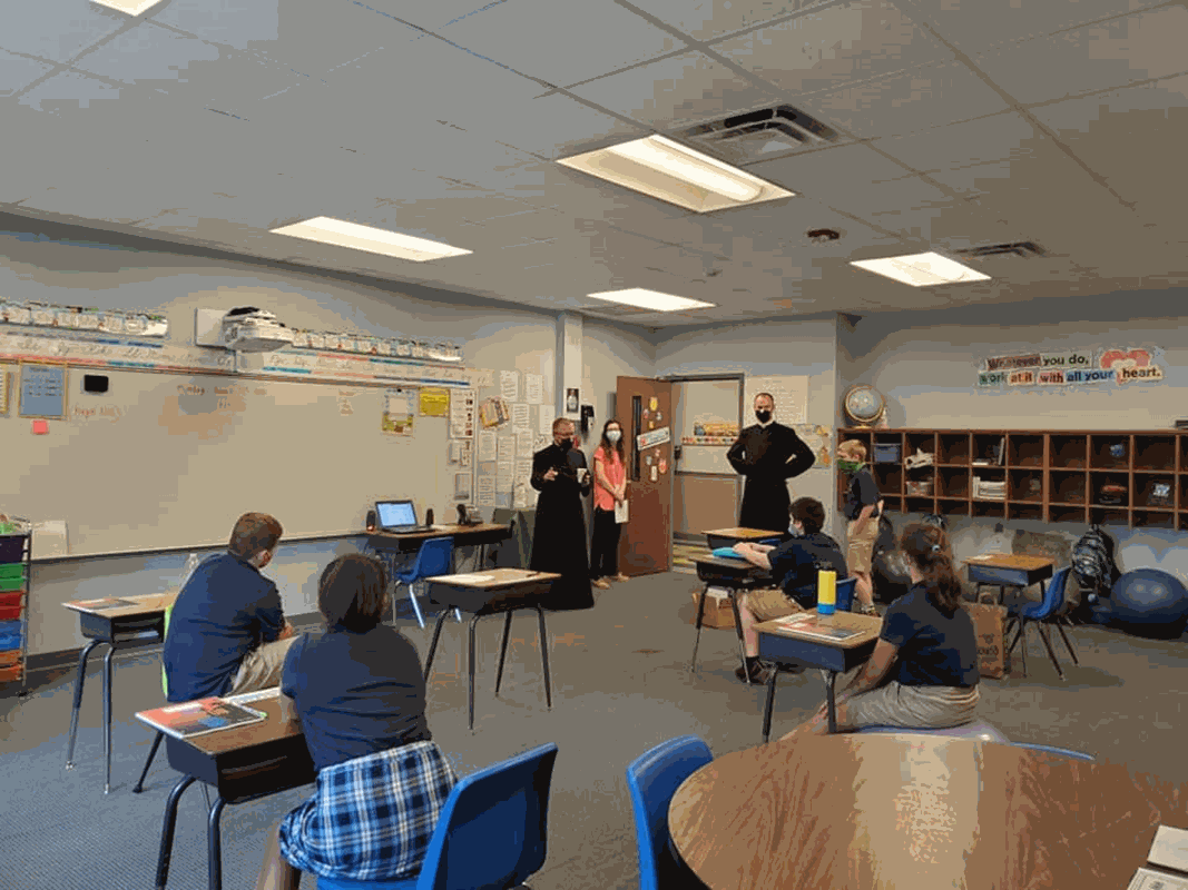 GREENSBORO — Our Lady of Grace students had very special visitors Aug. 31, Father Casey Coleman and Father Michael Carlson stopped by every classroom to say hi to the students and teachers and to give them a special blessing. (Photo via Facebook)