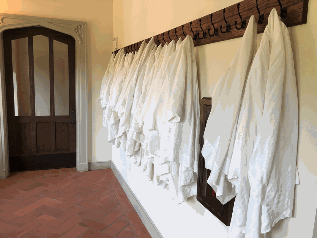 SJCS surplices hanging in hallway to chapel 9 15 2020 SAH (Copy)