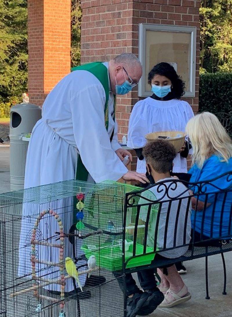 MOCKSVILLE — Dogs and birds were among the pets blessed at St. Francis of Assisi Church in Mocksville. (Photos provided by Sister Martha Hoyle)