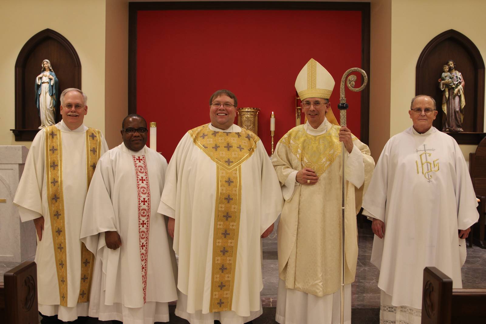 Concelebrating Mass Jan. 27 for the blessing of the new chapel along with Bishop Peter Jugis were current pastor Father James Stuhrenberg, Father Peter Nouck, parochial vicar and formerr Jugis and all those present for the dedication of the new chapel and