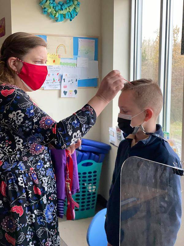 HIGH POINT — Immaculate Heart of Mary School students started Lent with a virtual Ash Wednesday Mass. The students received communion and a sprinkling of ashes on their head. (Photo via Facebook).