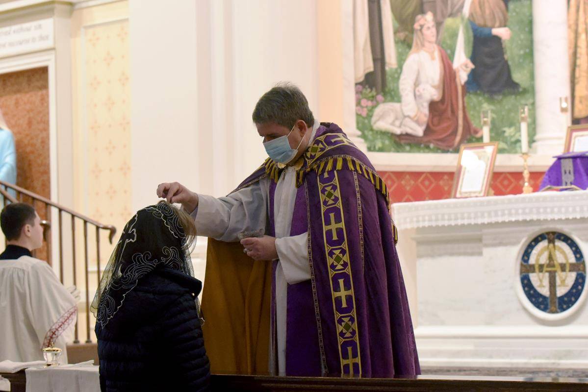 CHARLOTTE — St. Ann parish and the Charlotte Latin Mass Community commemorated Ash Wednesday and the beginning of Lent with a distribution of ashes and a Low Mass in the Extraordinary Form. (Photo by Markus Kuncoro)
