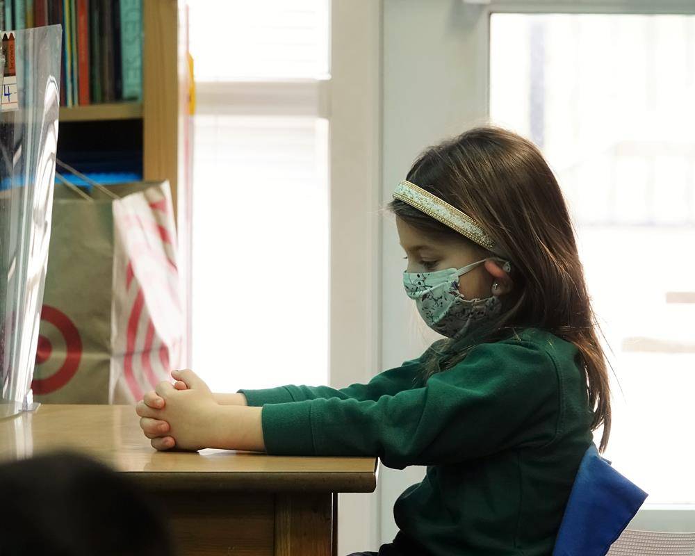 HUNTERSVILLE — St. Mark School had a Liturgy of the Word service that Fr. Alfonso Gámez prayed over the intercom on Ash Wednesday. (Photos provided by Amy Burger.)  
