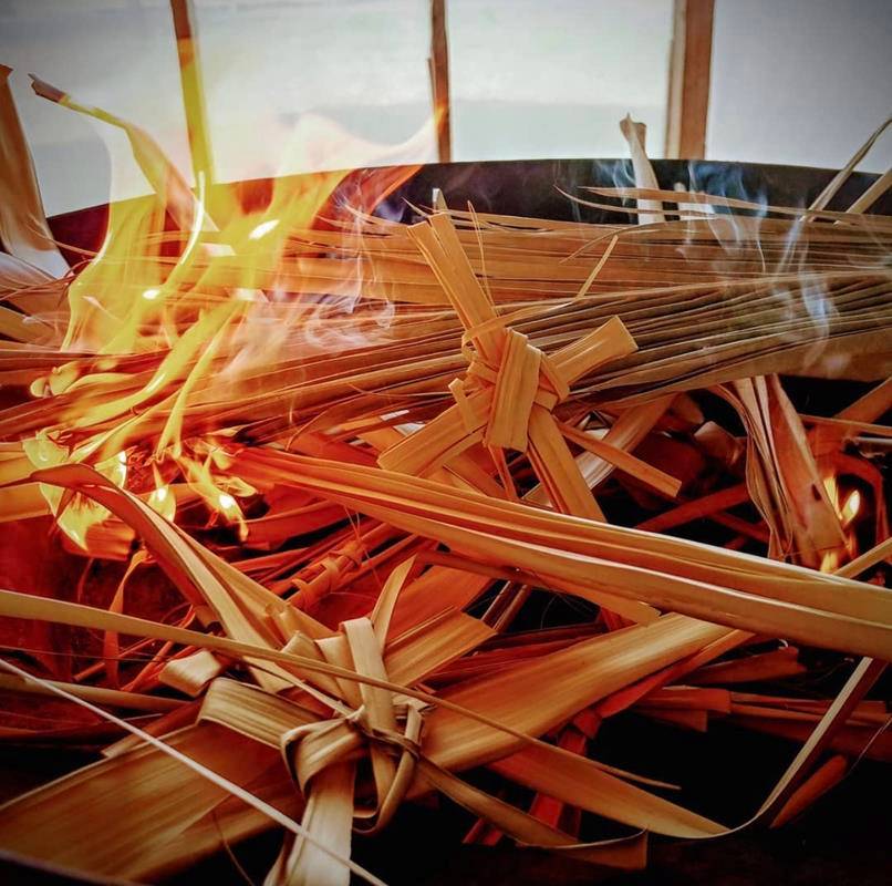 Deacon Matthew Newsome, the Catholic campus minister at Western Carolina University and the regional faith formation coordinator for the Smoky Mountain Vicariate shared this photo of burning the Palm Sunday palms to become ashes on Instagram.