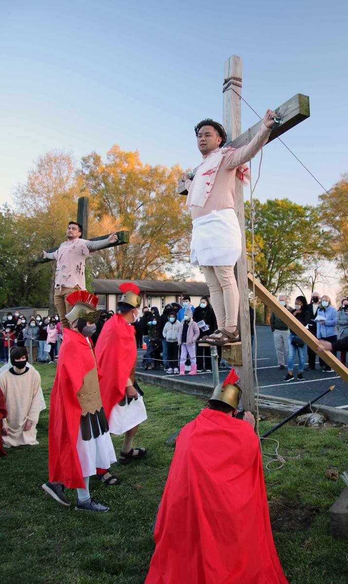 Members of St. John Neumann Church in Charlotte held a living Stations of the Cross on Good Friday, April 2. The annual tradition was canceled last year because of the pandemic. (Photo provided by Marty Schneider)