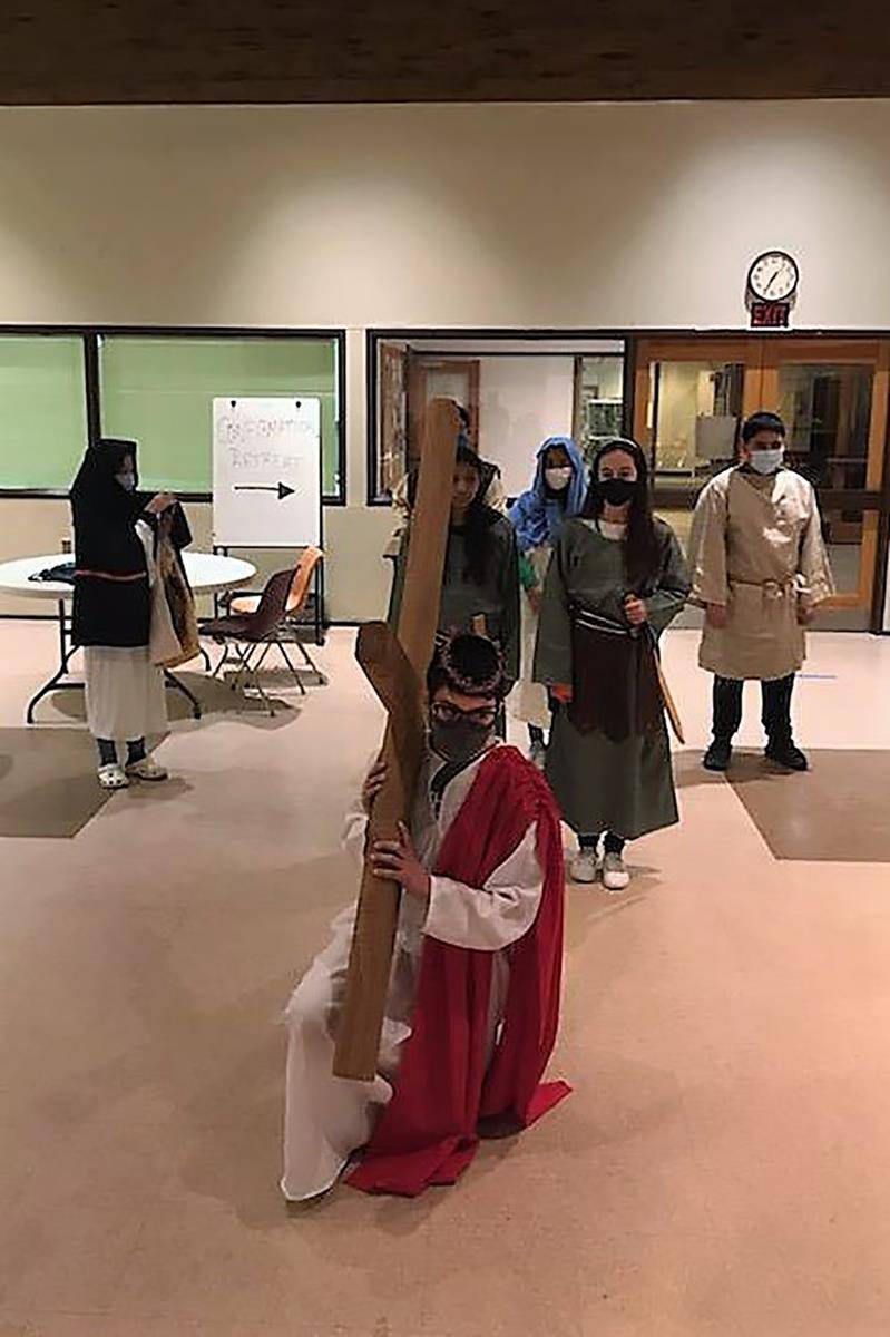 The eighth-grade faith formation class at St. Philip the Apostle Church in Statesville re-enacted the Living Stations of the Cross on Wednesday of Holy Week. (Photo provided by Connie Ries and Bobby Overcash)