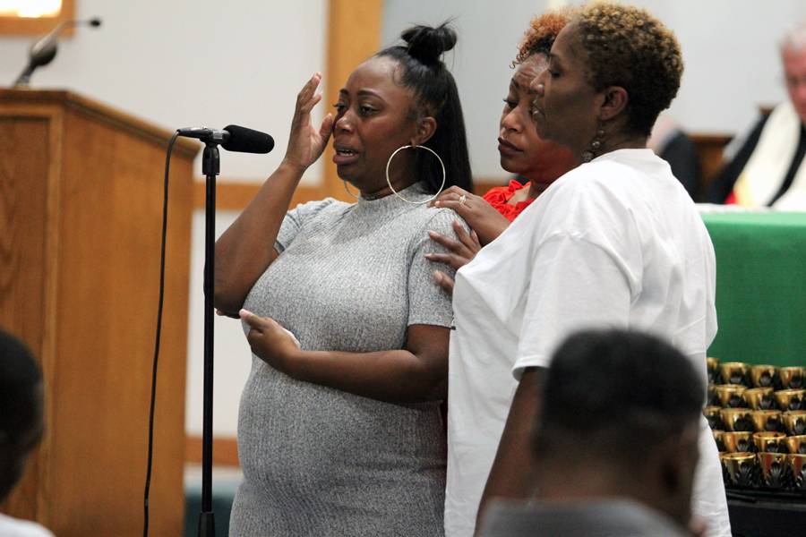 Tanae Ray, Justin Carr's girlfriend, weeps while describing the grief of losing him