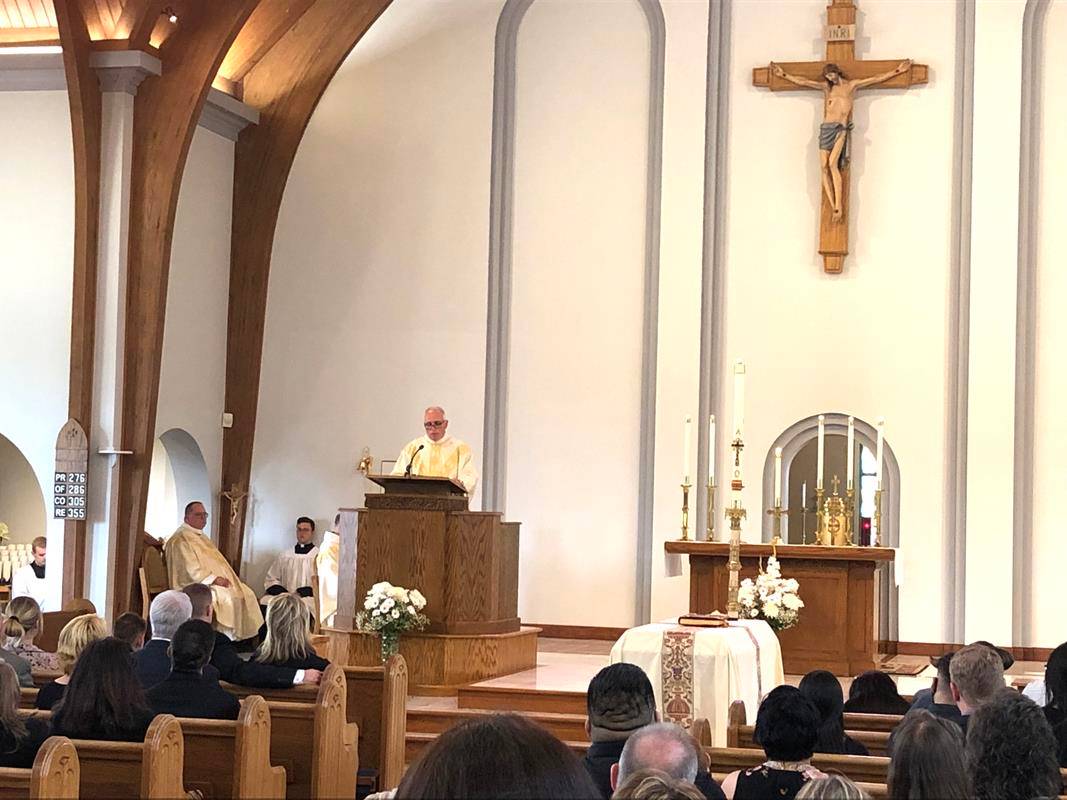 Father James Cox, a friend of Father Kottar's, delivers the homily.