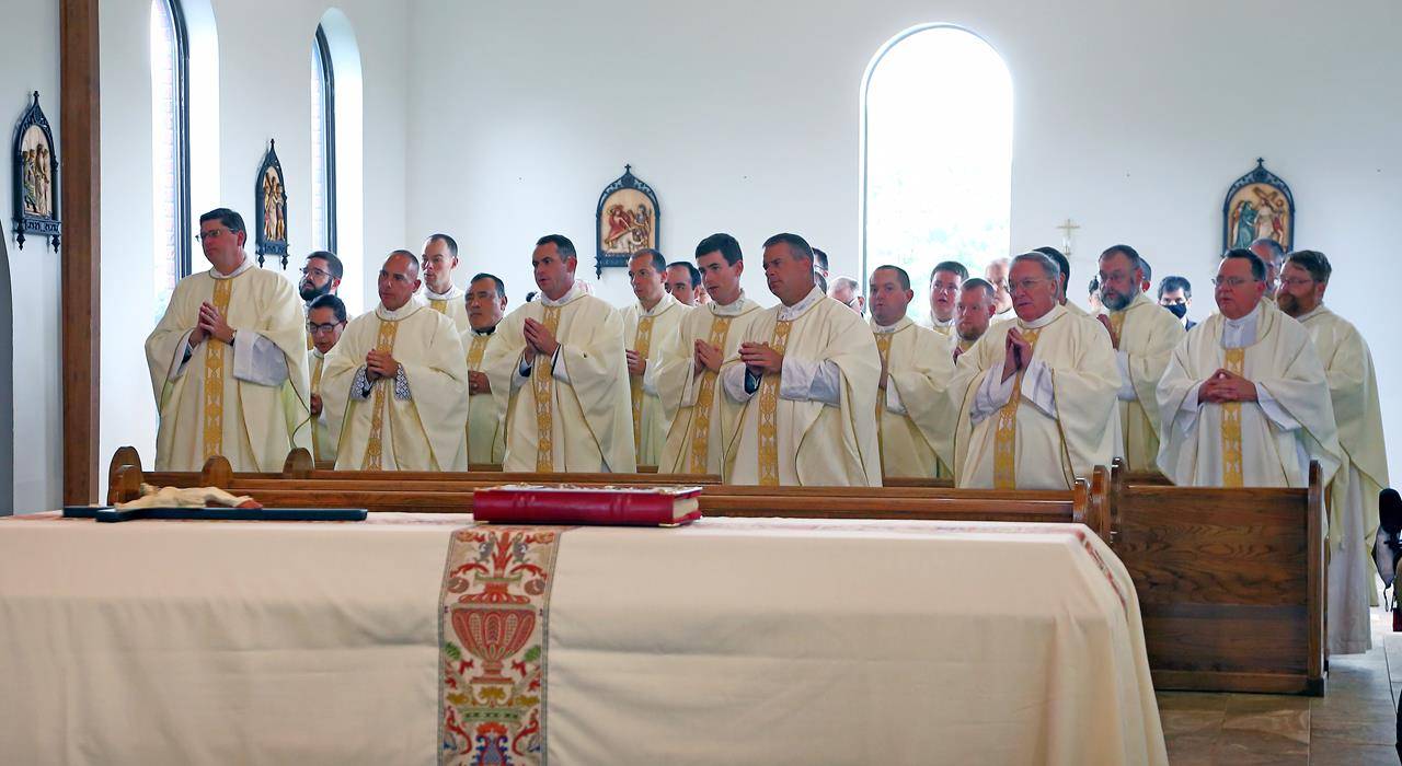 Priests from across the Diocese of Charlotte, including former pastors of St. Mary's, attended the funeral Mass.