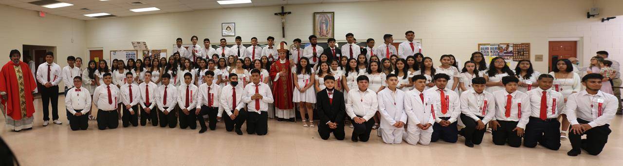 BOONVILLE — Dozens of young people at Divine Redeemer (Divino Redentor) Church recently received the sacrament of confirmation. Mass was offered by Bishop Peter Jugis and concelebrated by Father José Enrique Gonzalez Gaytán, pastor. (Sergio Lopez | Cathol