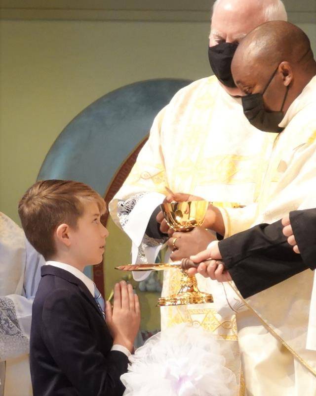 HUNTERSVILLE — Approximately 170 children received the sacrament of first Holy Communion during five Masses in May at St. Mark Parish. Pictured are First Communicants Jacob Dennis McCuen and Kayslee Brito. (Provided by Amy Burger)