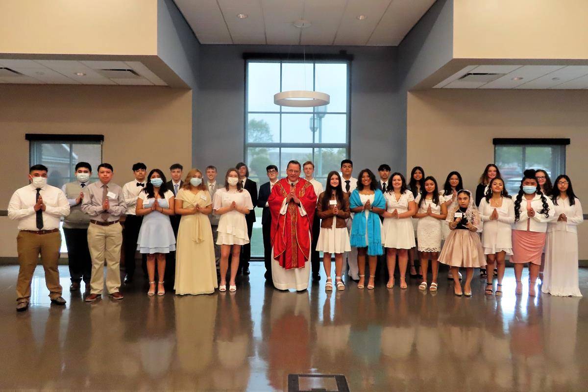 STATESVILLE — On May 12, Father Thomas J. Kessler, pastor, confirmed 26 candidates at St Philip the Apostle Church. (Photo provided by Connie Ries)
