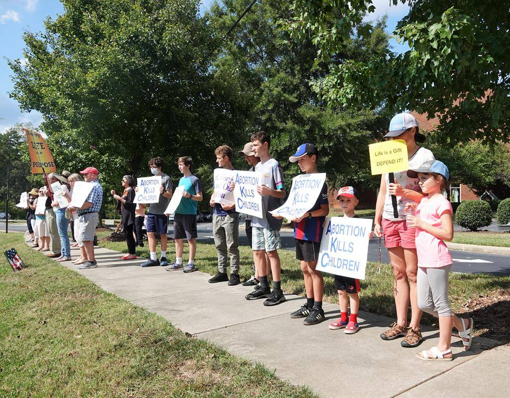 About 175 people formed a Life Chain outside St. Mark Church for Respect Life Sunday, Oct. 3. (Photos provided by Amy Burger)