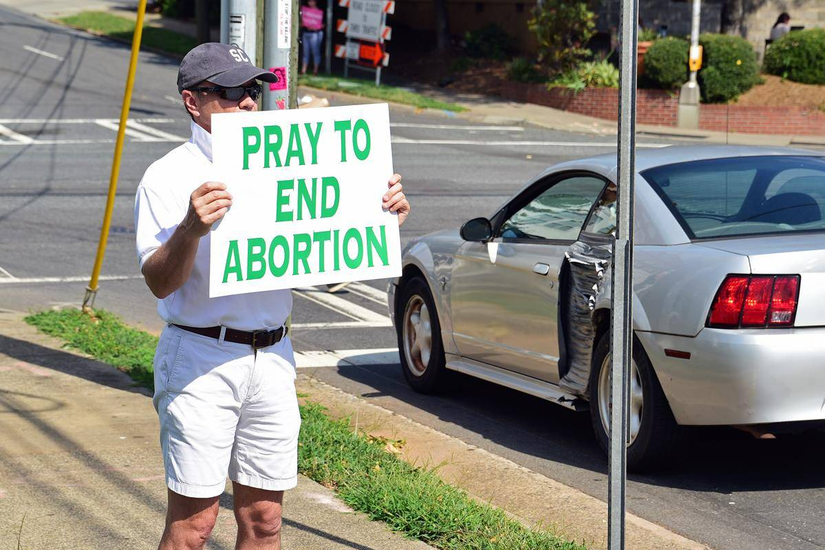 Parishioners and clergy from St Patrick Cathedral participated in a Life Chain prayer vigil along East Boulevard Oct. 3. (Photos provided by James Sarkis)