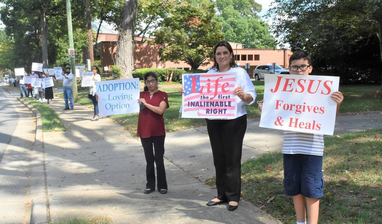 A beautiful, peaceful, prayerful start to Respect Life Month with a Life Chain outside St. Gabriel Church in Charlotte Oct. 3. For the protection of all human life, from conception to natural death, we pray! (Photo by John Ackerman) 