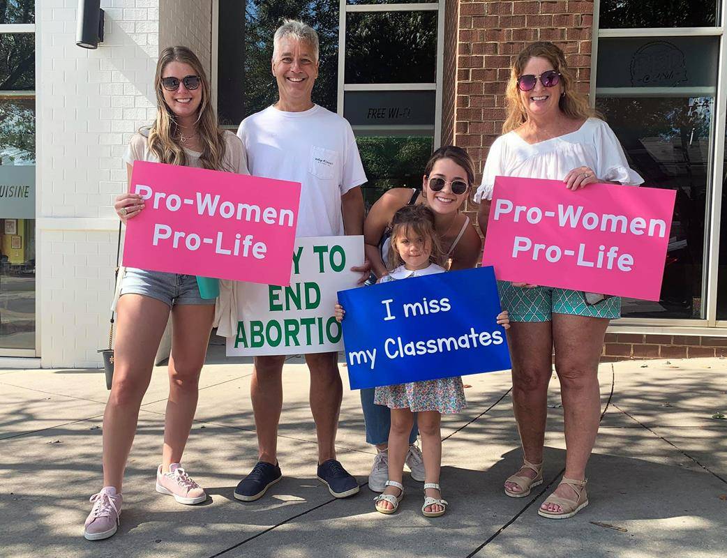 CHARLOTTE — Parishioners and clergy from St Patrick Cathedral participated in a Life Chain prayer vigil along East Boulevard Oct. 3. (Photos provided by James Sarkis)