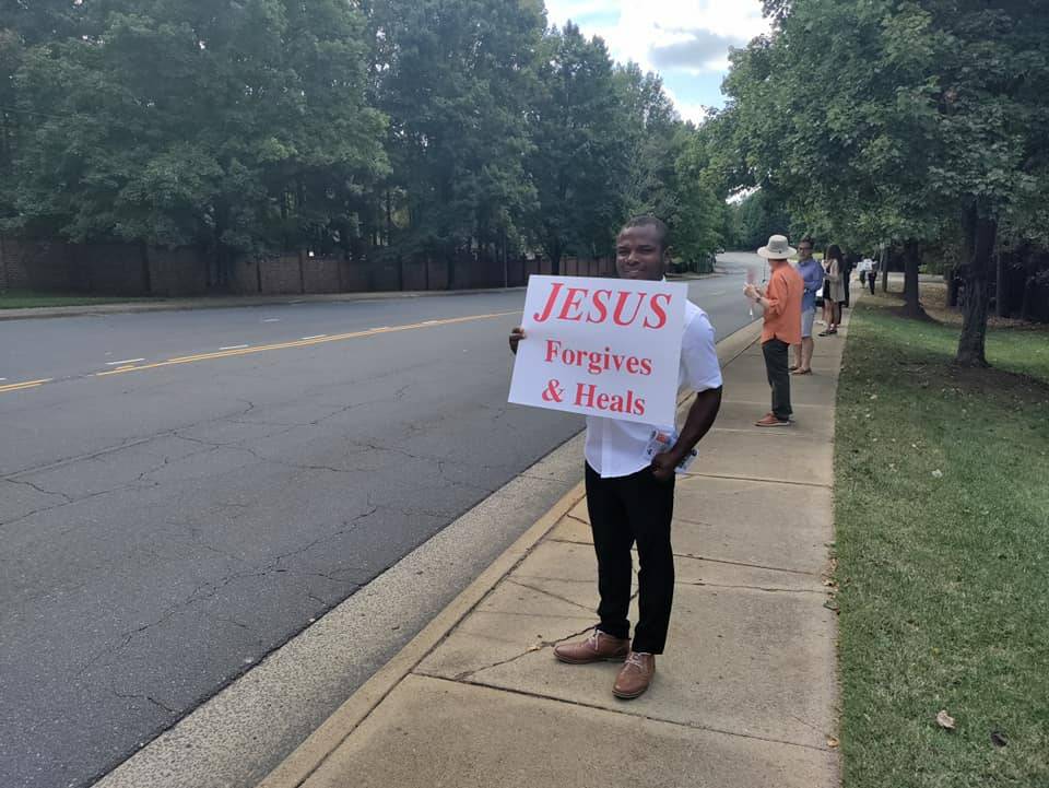 Pro-life supporters lined Park Road in Charlotte outside St. Vincent de Paul Church to pray for the Sanctity of Human Life. (Photos via Facebook) 