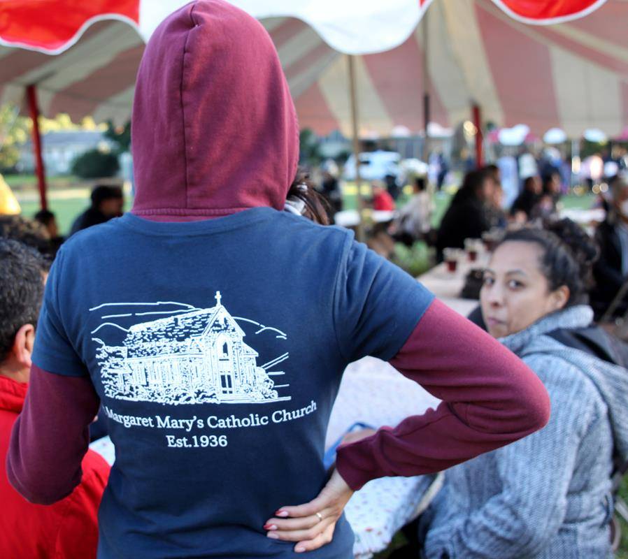 Souvenir T-shirts were among the fun aspects of the parish festivities in Grovemont Park. 