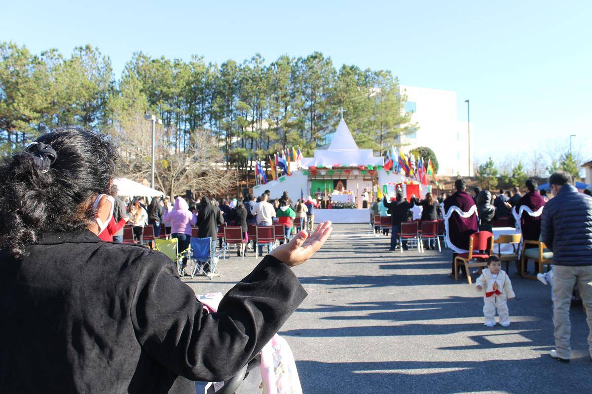 The outdoor Mass in Hamlet attracted hundreds of people to pray for the intercession of Mary and give thanks for her miraculous appearance to the indigenous people of Mexico 500 years ago. (Photo by César Hurtado)