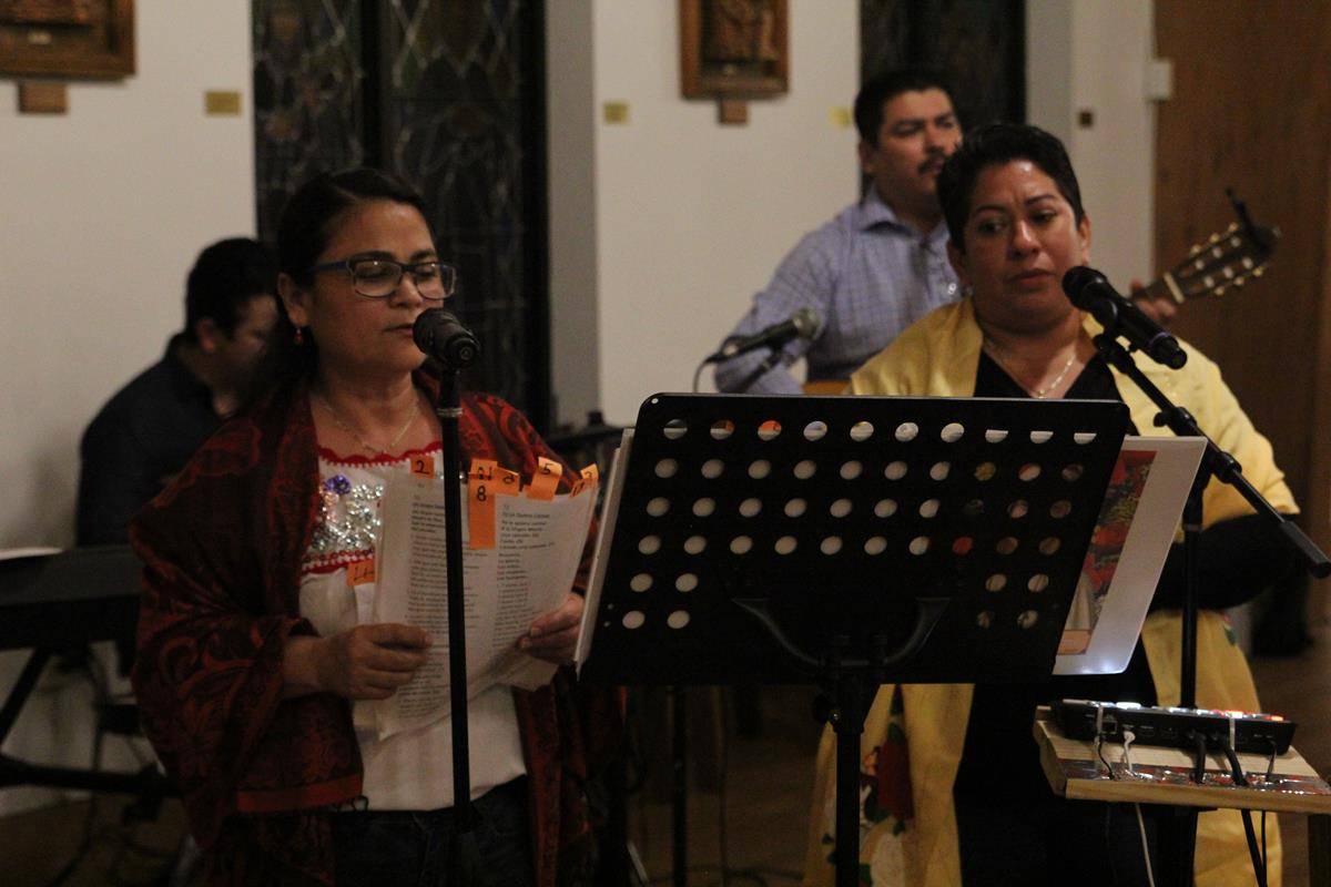Our Lady of Lourdes's celebration featured special hymns and music. (Photo by SueAnn Howell)