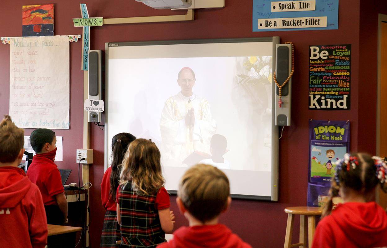 Students at St. Matthew School in Charlotte participate in the livestream Mass with Bishop Peter Jugis Jan. 31 to kick off Catholic Schools Week. (Photos by SueAnn Howell, Catholic News Herald)