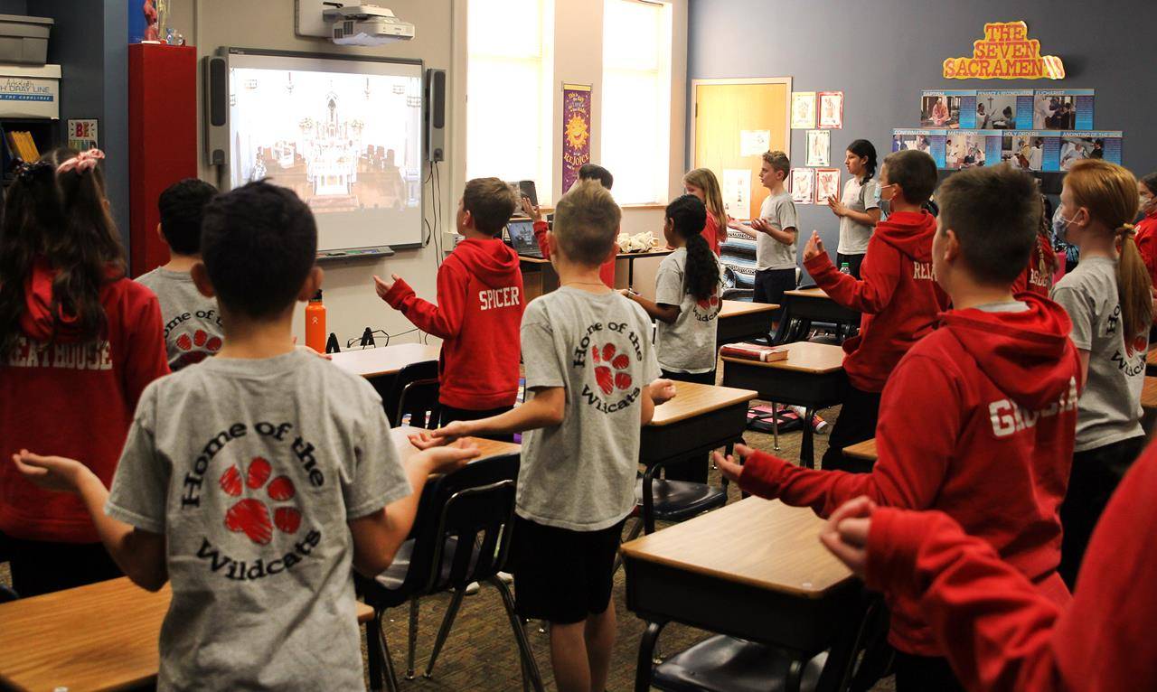Students at St. Matthew School in Charlotte participate in the livestream Mass with Bishop Peter Jugis Jan. 31 to kick off Catholic Schools Week. (Photos by SueAnn Howell, Catholic News Herald)
