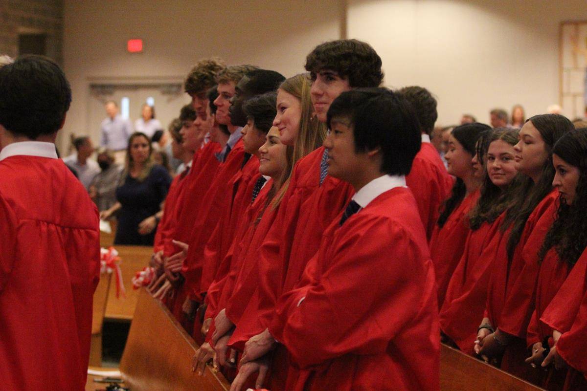 Members of the Charlotte Catholic High School Class of 2022 are all smiles during a baccalaureate Mass offered at St. Matthew Church May 24.  (SueAnn Howell | Catholic News Herald)