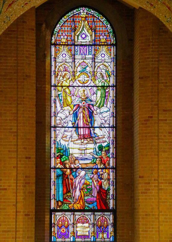 Our Lady of Grace is depicted in stained-glass from Belgium. Designed in Canada, the windows at Our Lady of Grace are based on those in the Cathedral of the Assumption in Three Rivers, Canada.