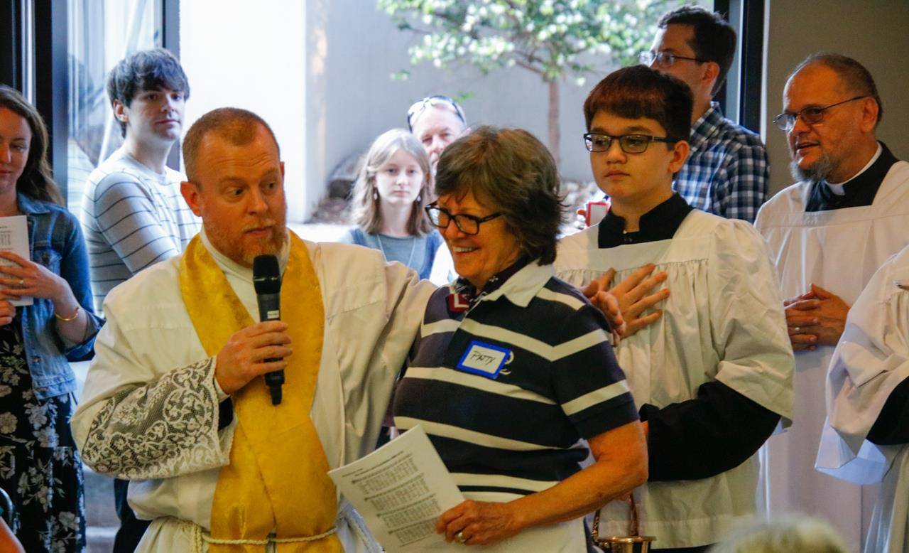 In the newly rededicated Kathleen Price Bryan Banquet Hall, Father Coleman offered heartfelt gratitude for the hard work and dedication of Volunteer Coordinator Patty Jennings for planning the 70th anniversary celebration. 