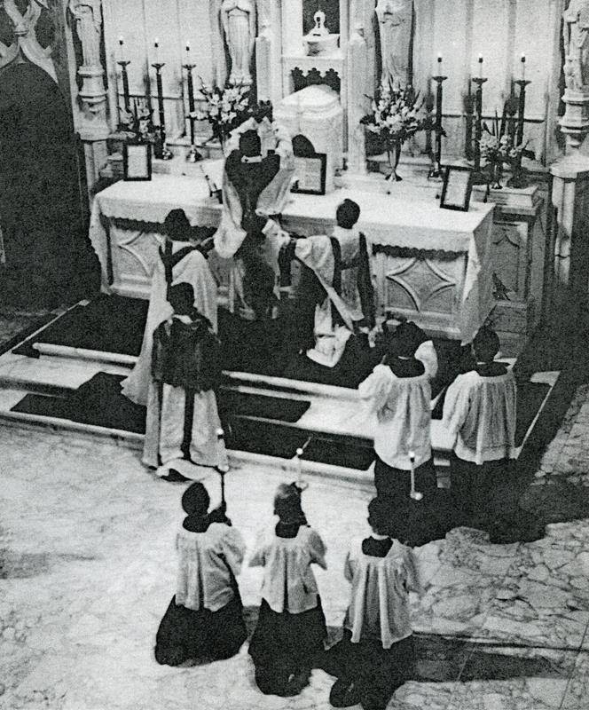 Monsignor Joseph Showfety blesses his parents at the altar rail on May 22, 1955.