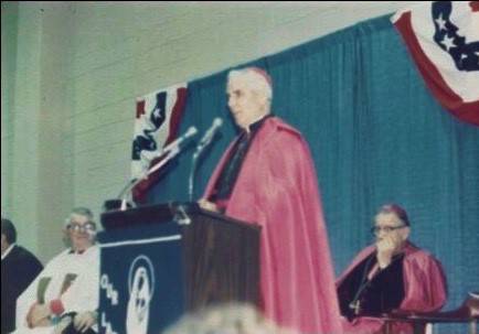 Archbishop Sheen speaks at the dedication of the new activity center, which included a gym, cafeteria and the addition of several classrooms for the Upper School.