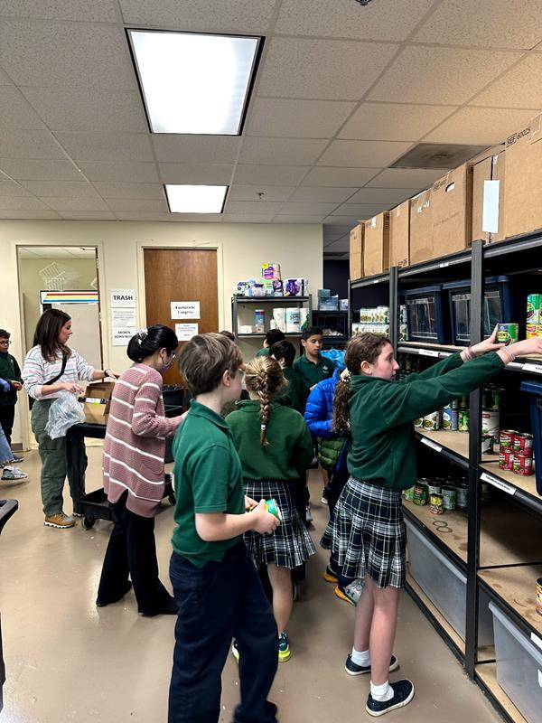 Kindergarten students then went to the Dilworth Soup Kitchen while the fifth graders went to the Catholic Charities Food Pantry to provide support as needed.