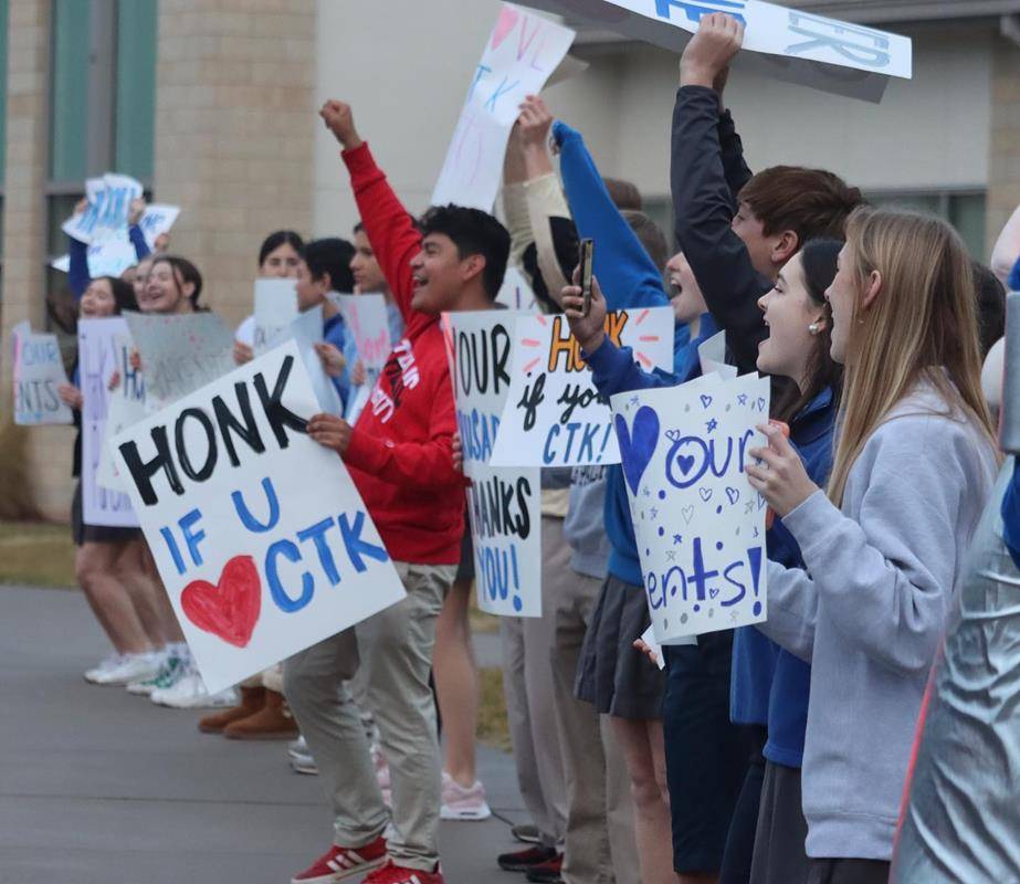 Students at Christ the King High School kicked off Catholic Schools Week celebration with a “honking” welcome for parents in morning carpool to thank parents. 