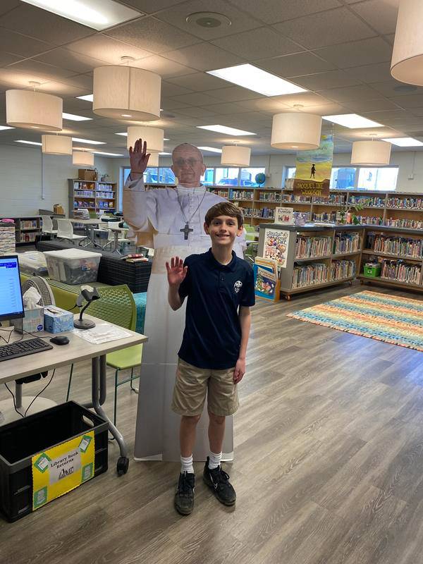 Sixth-grade students at St. Pius X School in Greensboro enjoy a surprise “visit” from Pope Francis.