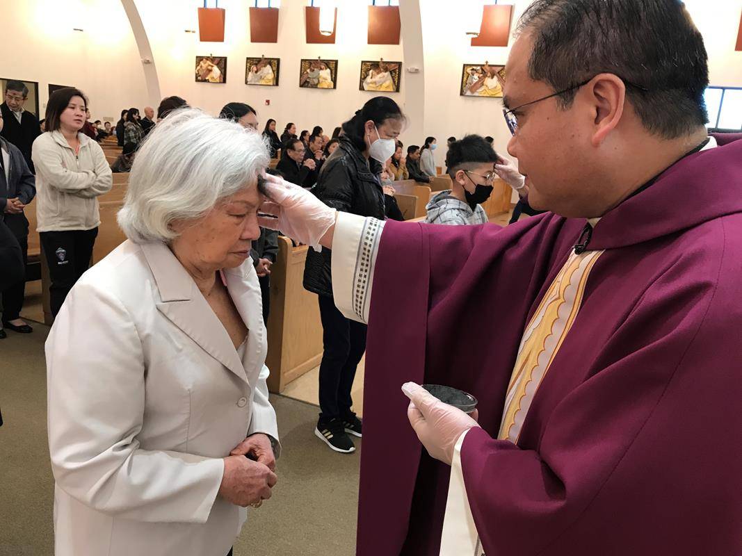 Father Tri Vinh Truong, pastor, of St. Joseph Vietnamese Church in Charlotte celebrated 7:30 a.m. Mass on Ash Wednesday. (Photos by Cesar Hurtado)