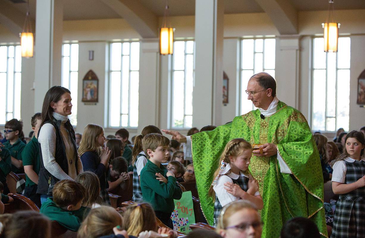Image1St. Mark students in Huntersville kicked off Catholic Schools Week with a Mass with Bishop Peter Jugis. (Photos by Jeannie DeSena) 